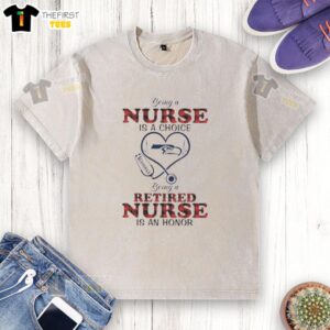 Alt Text: Seattle Seahawks-themed washed t-shirt for nurses, featuring a stethoscope and heartfelt tribute to retired nurses.