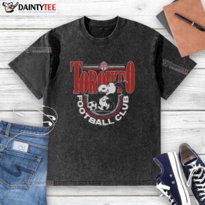 Official Peanuts Snoopy X Toronto FC washed t-shirt featuring a vibrant Snoopy graphic and team logo for fans.