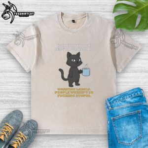 Alt Text: Original Cat Back T-Shirt featuring a vintage design with a humorous warning label about common sense and stupidity.