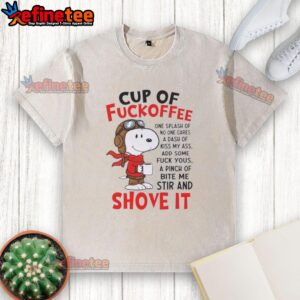 Alt Text: Snoopy coffee cup graphic on a humorous washed t-shirt with cheeky text and playful design elements.