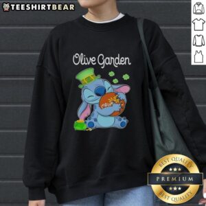 Pretty Stitch St. Patrick's Hug sweatshirt featuring Olive Garden logo, perfect for festive celebrations and cozy style.