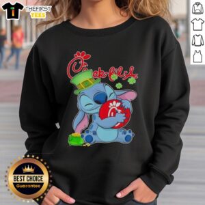 Alt Text: Cozy St. Patrick's Day sweatshirt featuring a nice stitch design and the Chick-fil-A logo for festive style.