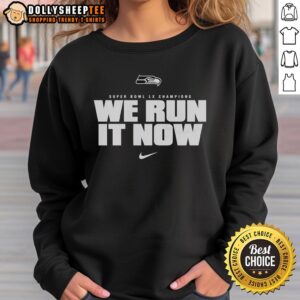 Alt Text: Premium Seattle Seahawks Super Bowl LX Champions sweatshirt featuring We Run It Now logo in vibrant colors.