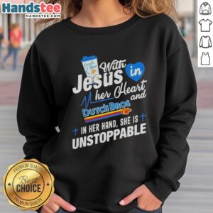 Unstoppable woman in a 'Pretty Dutch Bros Off With Jesus' sweatshirt, holding a Dutch Bros cup, radiating positivity.