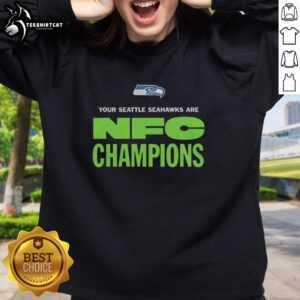 Alt Text: Original Seattle Seahawks NFC Champions logo sweatshirt featuring bold graphics and a comfortable design.