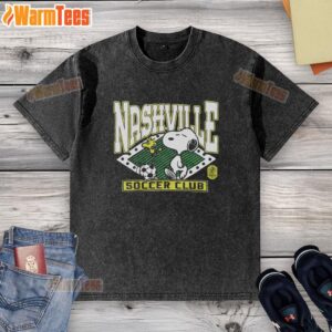 Alt Text: Official Peanuts Snoopy X Nashville SC washed t-shirt featuring a playful Snoopy graphic and vibrant colors.