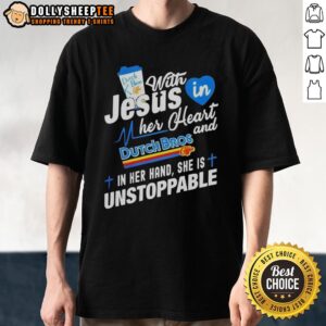 Unstoppable woman wearing 'Off With Jesus In My Heart' Dutch Bros t-shirt, holding a drink, radiating positivity.