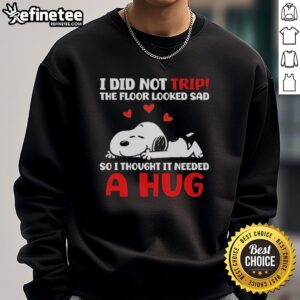Cozy sweatshirt featuring Snoopy with the quote, 'I did not trip; the floor looked sad, so I thought it needed a hug.'