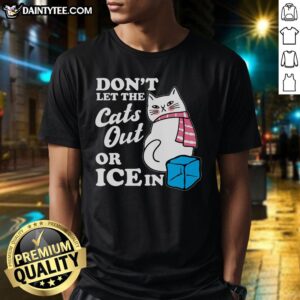 Funny anti-ice t-shirt featuring a humorous 'Don't Let The Cats Out Or Ice In' design for cat lovers and winter enthusiasts.