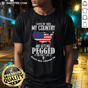 Alt Text: Funny meme T-shirt featuring 'I Love My Wife, My Country, and Getting Pegged' slogan for humorous apparel lovers.