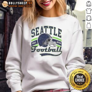 Alt Text: Retro Seattle Seahawks Super Bowl LX sweatshirt featuring a classic helmet design, established 1976. Perfect for fans!