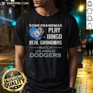 Grandmas watch Dodgers in a heart-shaped T-shirt, blending fun and fandom with 'Real Grandmas Watch Bingo' design.