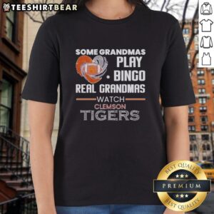 Real grandmas watch Clemson Tigers in stylish ladies tee while enjoying a fun game of bingo together.