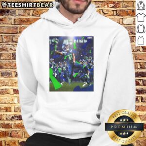 Alt Text: Jaxon Smith-Njigba in Seattle Seahawks Super Bowl LX Champions 2026 hoodie, celebrating victory on the field.