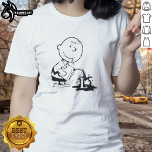 Official Charlie Brown political caricature ladies tee featuring a playful design of Charlie Brown in a humorous political theme.