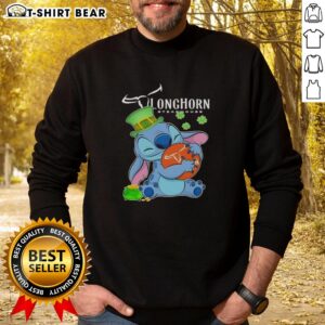 Pretty Stitch Hug Texas Longhorn Steakhouse logo on a Happy St. Patrick's Day sweatshirt design.