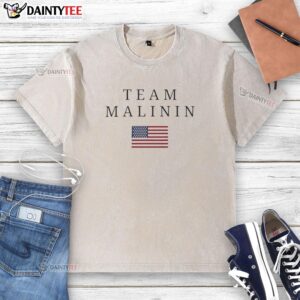 Alt Text: Good Team Malinin USA Flag Washed T-Shirt featuring a distressed American flag design on a soft cotton fabric.
