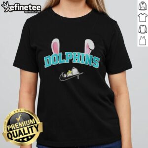 Miami Dolphins X Snoopy Happy Easter ladies tee featuring a vibrant design perfect for Easter celebrations.
