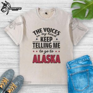Washed t-shirt featuring 'The Voices In My Head Keep Telling Me To Go To Alaska' graphic, perfect for casual wear.