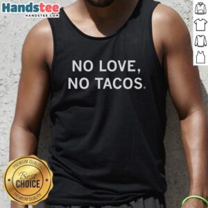 Alt Text: Woman wearing a 'Pretty No Love No Tacos' tank top, showcasing a fun and humorous graphic design.