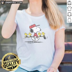 Alt Text: Cute Peanuts Snoopy and Woodstock golf ladies tee featuring beloved cartoon friends in a playful design.