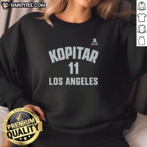 Alt Text: Los Angeles Kings sweatshirt featuring Anze Kopitar's name and number 11 in bold, stylish design.