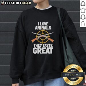 Cozy 'I Love Animals - They Taste Great' sweatshirt in vibrant colors, perfect for animal lovers with a sense of humor.