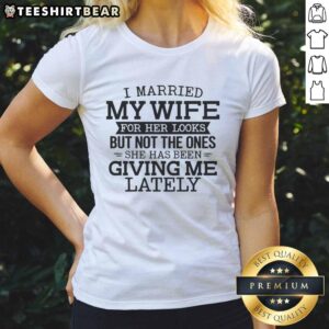 Funny tee shirt design reading 'I Married My Wife for Her Looks' with humorous graphics, perfect for couples or gifts.