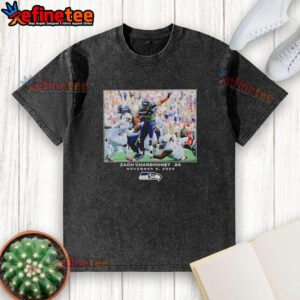 Alt Text: Premium Zach Charbonnet Seattle Seahawks football graphic washed t-shirt, featuring vibrant team colors and logo.
