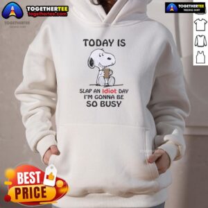 Cozy hoodie featuring Snoopy and 'Today Is Slap An Idiot Day' design, perfect for fans of Peanuts and fun humor.