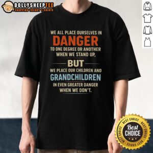 Premium 'We All Place Ourselves In Danger' T-Shirt design featuring bold text, perfect for expressive fashion lovers.