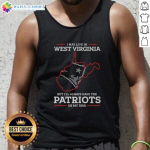 Good I May Live In West Virginia But I'll Always Have The New England Patriots In My DNA tank top on a model.