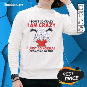 Alt Text: Snoopy sweatshirt featuring 'I don't go crazy, I am crazy' quote, perfect for Peanuts fans and casual wear.