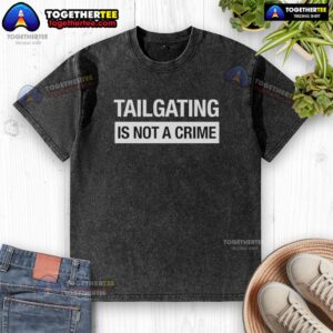 Funny washed t-shirt reading 'Hot Tailgating Is Not A Crime' perfect for sports fans and tailgating enthusiasts.