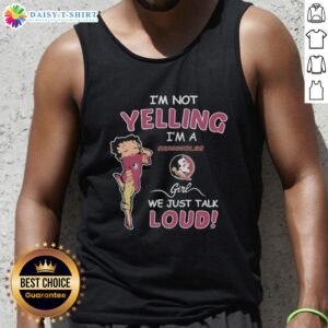 Florida State Seminoles girl wearing 'I'm Not Yelling, I'm Just Talking Loud' tank top at a game, showing team spirit.