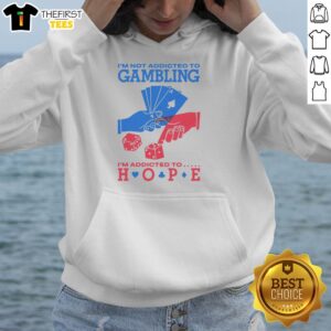 Alt Text: Funny hoodie with 'I'm not addicted to gambling, I'm addicted to hope' slogan, perfect for casual wear and humor.