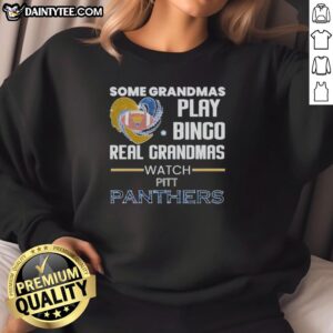 Real grandmas in Pittsburgh Panthers sweatshirt playing bingo together, showcasing fun and community spirit.