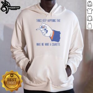 Funny Things Keep Happening That Make Me Want A Cigarette Hoodie in a cozy setting, perfect for casual wear and humor lovers.