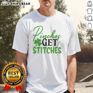 Official Pinches Get Stitches Irish T-Shirt featuring a fun design perfect for St. Patrick's Day celebrations.