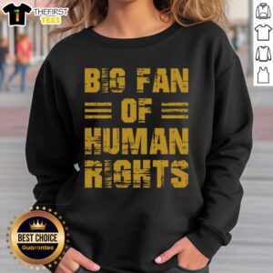 Alt Text: Stylish 'Pretty Big Fan of Human Rights' sweatshirt worn by a rights advocate at a social justice event.