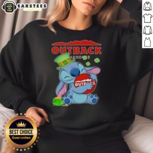 Cute Stitch hugging Outback Steakhouse logo on a Happy St. Patrick's Day sweatshirt design.