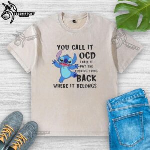 Alt Text: Original Stitch You Call It OCD, I Call It Put The F*cking Thing Back washed t-shirt displayed on a hanger.