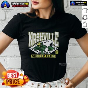 Alt Text: Awesome Peanuts Snoopy X Nashville SC ladies tee featuring vibrant graphics and comfortable fit for fans.