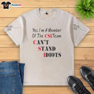 Official 'Yes, I'm a Member of the CSI Team' T-shirt featuring a humorous quote about idiots, perfect for CSI fans.