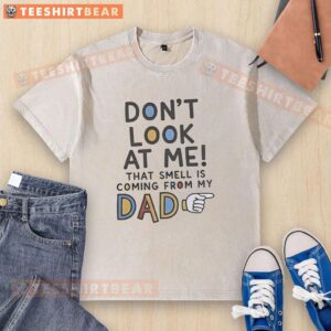 Alt Text: Funny 'Don't Look At Me, That Smell Is Coming From My Dad' washed T-shirt featuring humorous typography design.