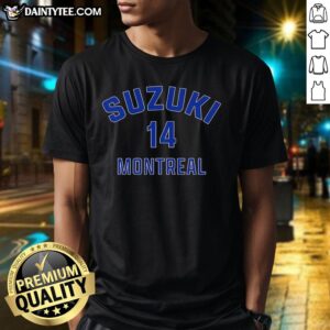 Original Nick Suzuki 14 Montreal Canadiens hockey T-shirt featuring team colors and player name printed prominently.