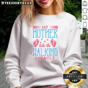 Good My Mother Is A Walking Miracle Sweatshirt in soft fabric, featuring a heartwarming design for moms.