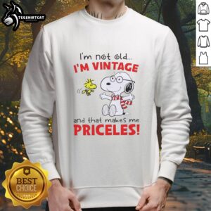 Official Peanuts Snoopy sweatshirt with 'I'm Not Old, I'm Vintage, and That Makes Me Priceless' design
