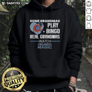 Premium hoodie featuring grandmas playing bingo while watching the Orlando Magic, perfect for sports and bingo enthusiasts.
