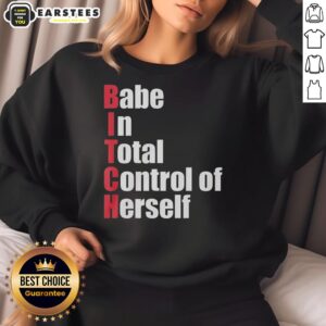 Awesome babe in total control of herself wearing a bold red text sweatshirt, showcasing confidence and style.